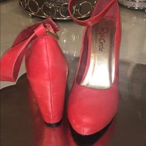 Red wedge shoes